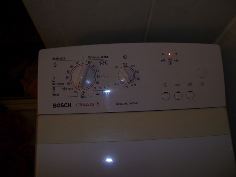 Вертикальная машинка бош. Машинка стиральная Bosch Classixx 5. Стиральная машинка вертикальной загрузки Bosch classixx5. Стиральная машинка бош Классик 5 с верхней загрузкой. Стиральная машина Bosch Classixx 5 вертикальная загрузка.
