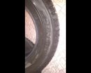 Продаются зимние шины шипованные dunlap 195/65 r-15  пробег 2000 км. в Тюмени