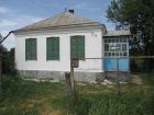 Земельный участок и добротный дом в ст. петропавловской в Краснодаре