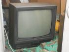 Старый телевизор в рабочем...