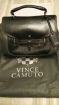  Vince Camuto ()....