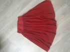 Красная полупрозрачная юбка