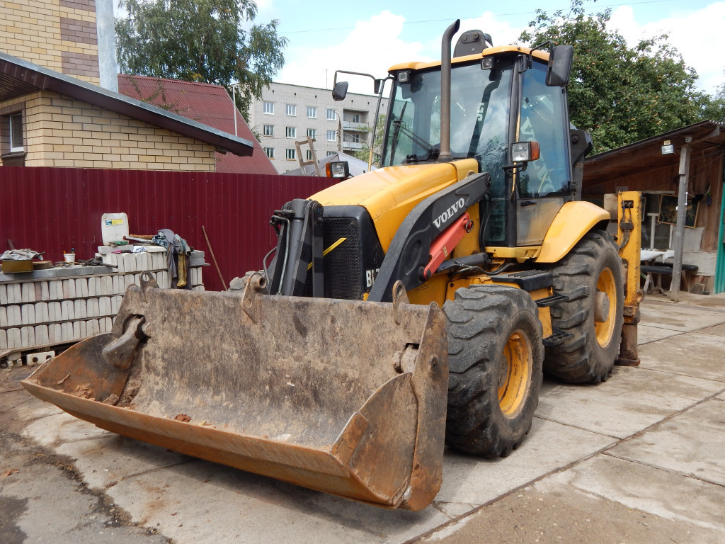 Экскаватор погрузчик вольво. Volvo BL 78. Трактор Вольво вл 71. Экскаватор погрузчик BL 71. Челюстной погрузчик Вольво.