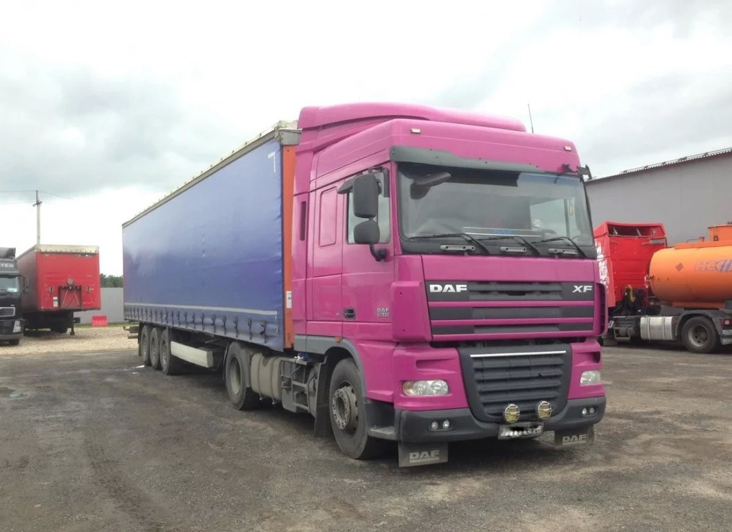 Даф 105 2008. DAF XF 105 2008. DAF XF 105 фиолетовый. DAF 2008. Рено премум 15 тон.