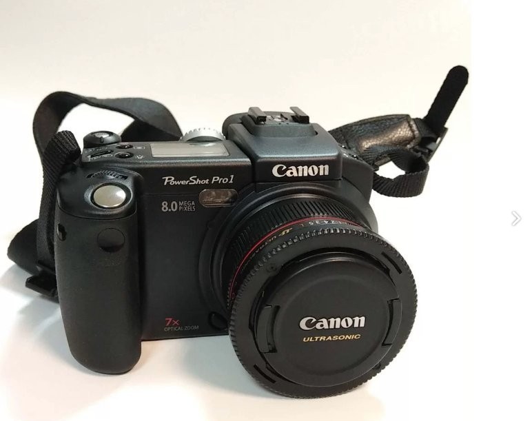 Canon. Кэнон ПОВЕРШОТ 2300 зарядка.